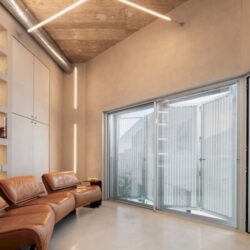 Design-led sea-view townhouse for sale with lift, garage and rooftop terrace in alcudia