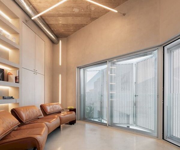 Design-led sea-view townhouse for sale with lift, garage and rooftop terrace in alcudia