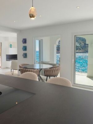 Sea view duplex penthouse for sale in port d'andratx with private rooftop and direct sea access